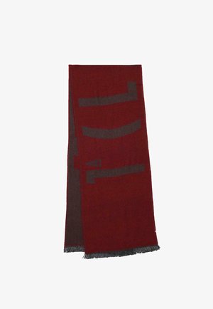 Sciarpa intrecciata rossa e grigia con motivi astratti, bordi sfrangiati e texture morbida. Forma rettangolare, adatta a vari stili.