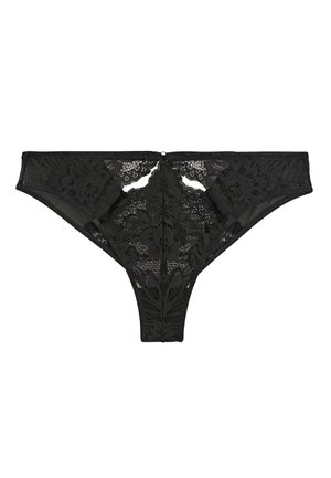 String noir en dentelle avec motifs floraux et une petite découpe centrale sur fond blanc.