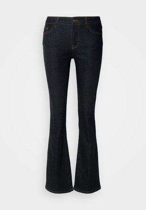 Tumedat sinised laiad teksad, valmistatud denimist. Omab keskmist vöökohta, viit taskut ja kontrastset nööride õmblust. Klassikaline ja funktsionaalne disain.