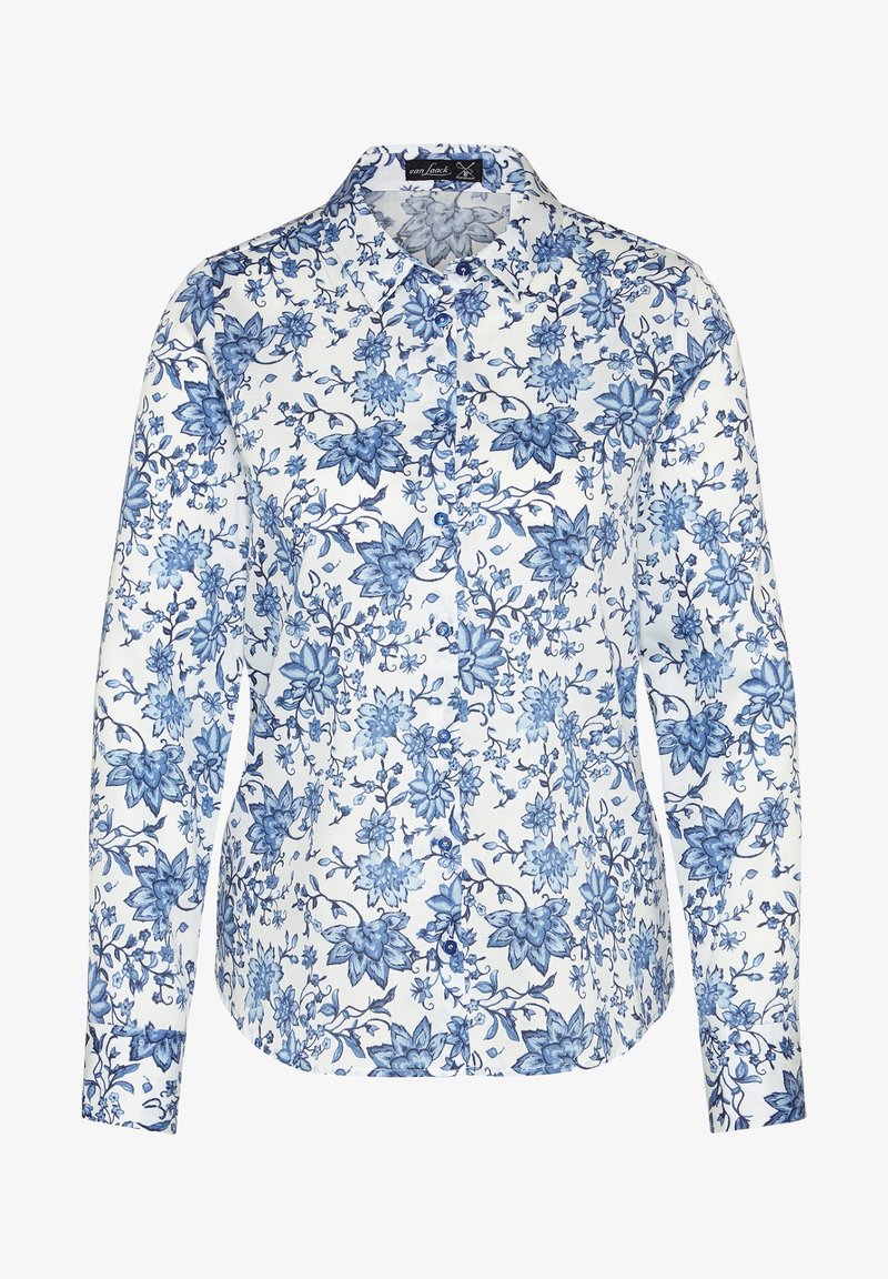 Valkoinen pitkähihaiseksi napitettu paita, jossa on sininen kukkakuosi ja terävä kaulus.