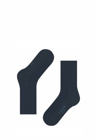 Chaussettes en coton navy avec texture côtelée et orteil renforcé. Présente un logo bleu clair sur le côté de chaque chaussette. Convient pour un usage quotidien.