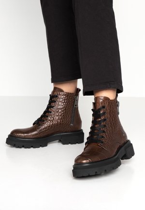 Bottines à plateau - cognac