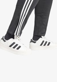 adidas Originals ADICOLOR SUPERSTAR PLUS SIZE - Træningsbukser - black