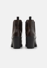 Marco Tozzi Platform ankle boots - mocca