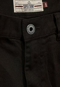 Next SUPER SKINNY - Testhezálló fazon - black