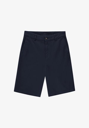 Tengerészkék térdig érő rövidnadrág övbújtatókkal, elülső gombos záródással és oldalzsebekkel fehér háttéren.