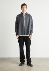 Calvin Klein Jeans GARMENT DYE SHIRT - Srajca - ebony