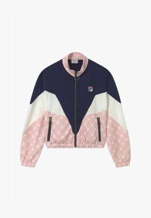 Giacca cropped con design a blocchi di colori blu navy e bianco, sezione inferiore con motivo rosa e tasche con zip. Include un colletto rialzato e un tirante a forma di anello.