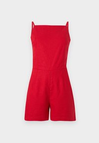 Salopette rossa in lino con spalline sottili, scollatura quadrata e dettaglio plissettato sul davanti. Vestibilità sartoriale con pantaloni corti, design minimalista.
