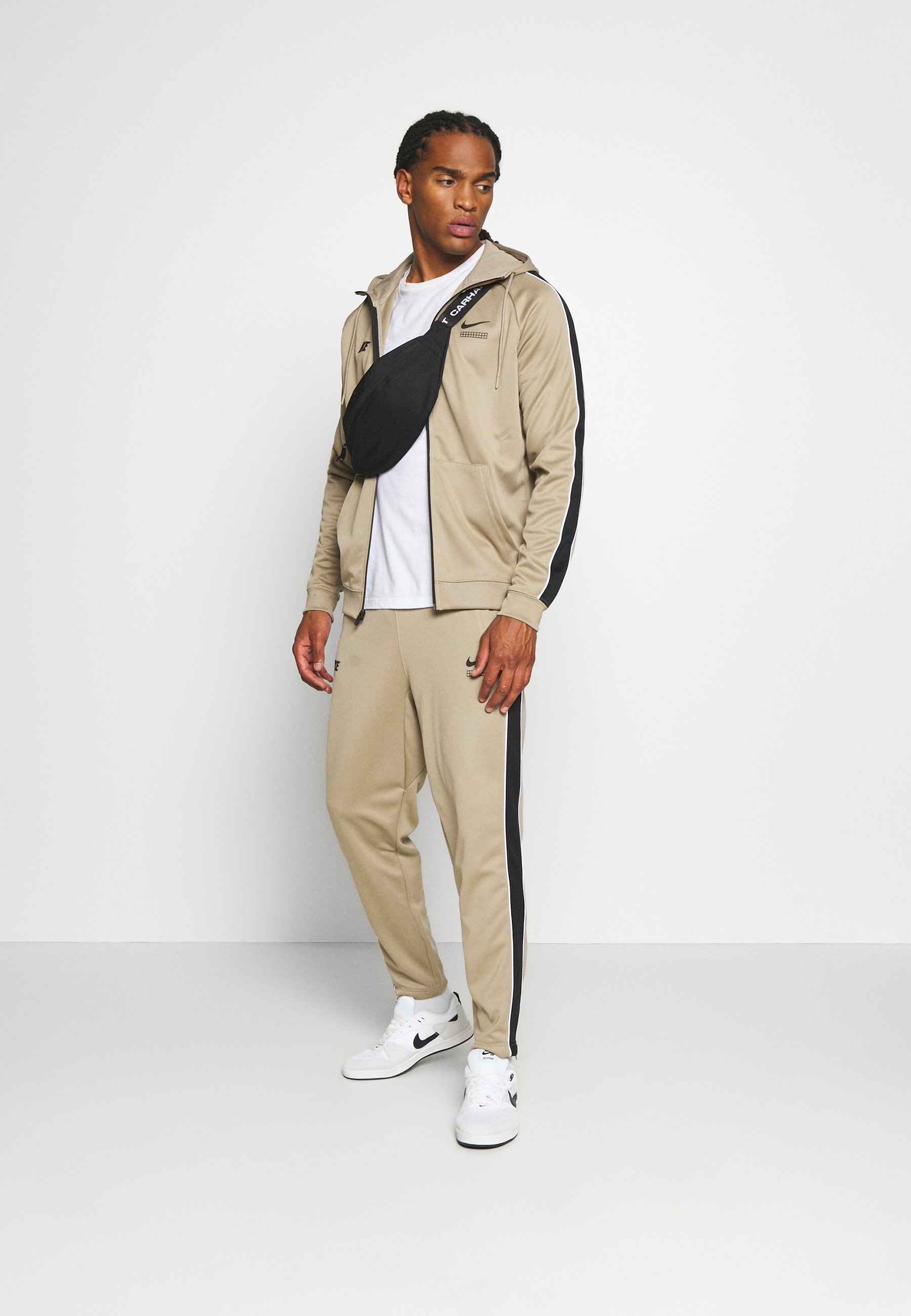 khaki and black jacket