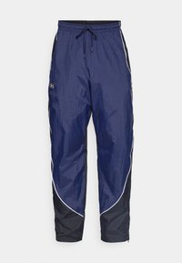 BEST TRACK PANT - Tracksuit bottoms - black/midnight navy/white