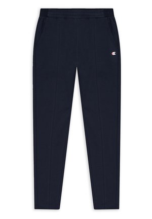 Pantalon de jogging slim-fit bleu marine avec ceinture élastique, poches latérales et petit logo Champion sur la cuisse supérieure gauche.