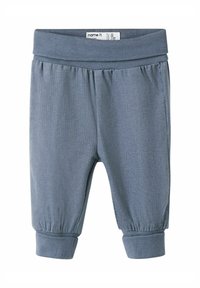 Light blue ribbed cotton pants with an elastic waistband and cuffed ankles, featuring a soft texture and a relaxed fit.
