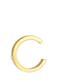 Goldene Metallbuchstabe "C" mit einem glatten, abgerundeten Design und einem kleinen klaren Edelsteinakzent auf einer Seite.