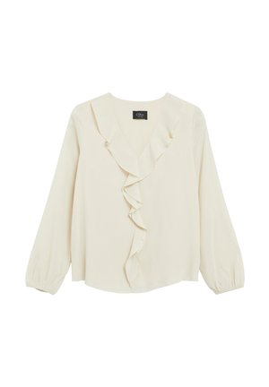 Blouse crème à manches longues avec col en V volanté et poignets élastiques, présentée sur fond blanc.