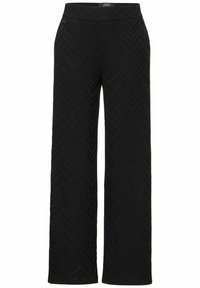 Schwarze, weit geschnittene Hose mit einem strukturierten Chevron-Muster. Verfügt über einen elastischen Bund und ein glattes Finish. Eignet sich für die Freizeit.