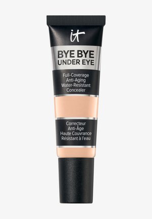 Tube de correcteur IT Bye Bye Under Eye à couvrance totale, anti-âge, résistant à l'eau, avec un bouchon noir et un emballage noir, argenté et beige.