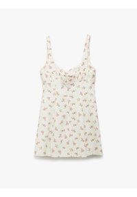 Mouwloze jurk met bloemenprint in lichtcrème stof, met roze en groene bloemen, een geraffineerde taille en een nonchalante pasvorm.