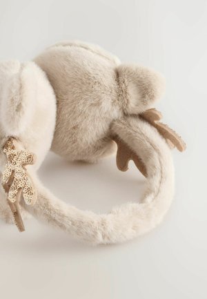 Faux fur ørevarmere i lys beige med en blød tekstur, der har en læderdetalje formet som gevir. Rund, blød design.