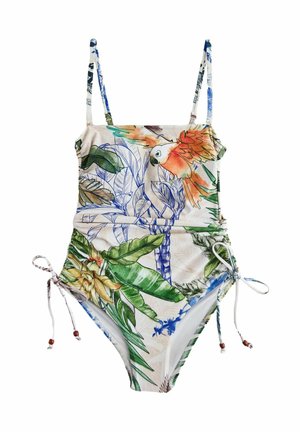 Costum de baie dintr-o singură piesă, cu bretele subțiri și legături laterale, având un imprimeu colorat cu frunze tropicale și un papagal portocaliu pe un fundal deschis.