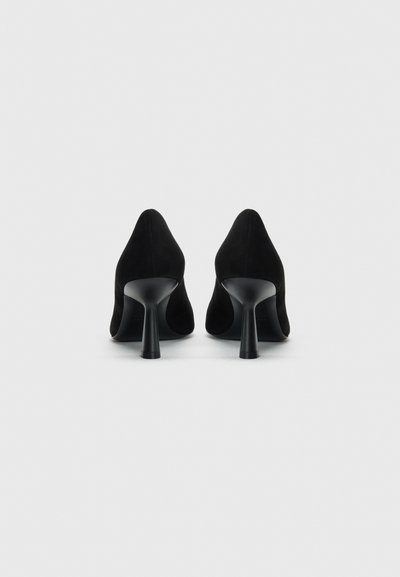 Black suede high-heel shoes with a pointed toe design and a sleek, slender heel, featuring a smooth texture and minimalist style.