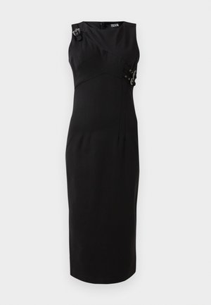 Must mustriga kleit ilma varrukateta, struktureeritud rinnaosa, külgdetailidega, kus on metallaktsente, ja põlve pikkune sirge seelik.