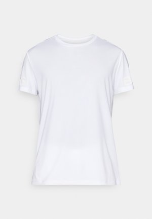 Valkoinen lyhythihainen t-paita, joka on valmistettu kevyestä kankaasta. Siinä on pyöreä kaula-aukko ja hienovarainen tekstuurikuvio. Logo on painettu hihalle.