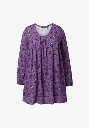 Lilla langærmet tunika med blå og sort blomstermønster, rund halsudskæring, læg foran og dekorativ kant ved kanten.