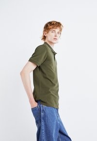 Levi's® Polo majica - olive night