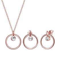 Smyckeset i roséguld som innehåller ett cirkulärt hängsmycke med kristall och matchande hoops örhängen med kristaller, alla i en polerad metallfinish.