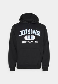 Felpa nera con cappuccio e tasca a marsupio frontale. Presenta il logo Jordan blu e bianco e la scritta "SPORT". Il materiale sembra morbido e ha una vestibilità standard.
