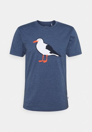 T-shirt bleu à manches courtes avec un grand graphisme d'une mouette blanche et noire avec un bec et des pattes orange à l'avant.