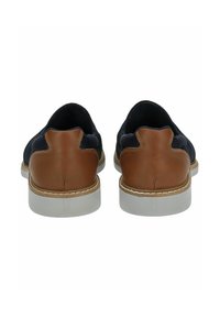 Scarpe slip-on in tessuto blu navy con dettagli in pelle marrone, suole in gomma bianca e cuciture a contrasto sul tallone.