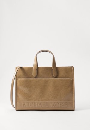 Brun læder håndtaske med to håndtag og en aftagelig skulderrem. Har struktureret overflade og præget "MICHAEL KORS" logo.
