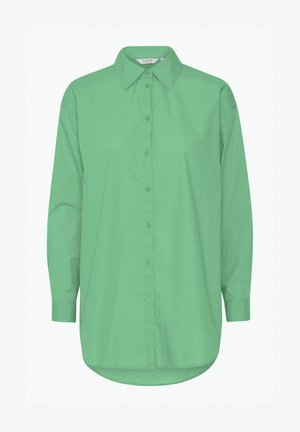 Roheline nööpidega särk, mis on valmistatud siledast kangast, klassikalise krae, pikkade varrukate ja lõdva istuvusega kaardus allääriga.