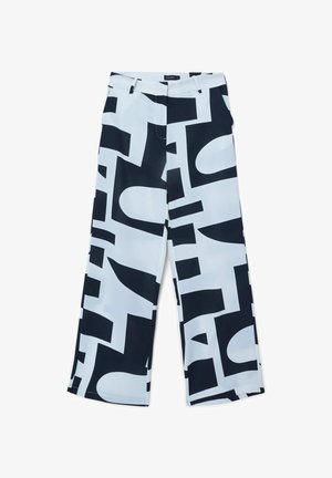 Pantaloni a gamba larga in un tessuto azzurro chiaro con un audace motivo astratto nero. Comprendono tasche laterali e una chiusura con zip.