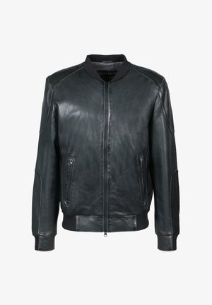 Schwarze Bomberjacke aus Leder mit Reißverschluss, geripptem Kragen, Bündchen, Saum und seitlichen Reißverschlusstaschen.