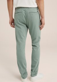 WE Fashion THE JOG - Pantaloni chino - green