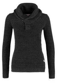 Pull en maille noire avec un col châle, des manches longues, un motif texturé et une petite étiquette logo en bas de l'ourlet.