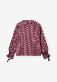 Langärmlige Bluse mit pinkem und lila Blumenmuster, geraffte Bündchen mit Quastenbindungen und einem kleinen Kragen auf weißem Hintergrund.