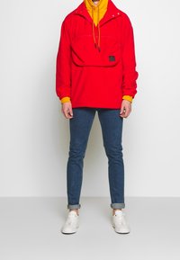 McQ Alexander McQueen Jersey con capucha - mustard yellow