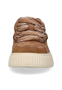 Brown suede sneaker with textured, braided laces and a thick, ridged cream sole. Features a rounded toe and contrasting stitching details.