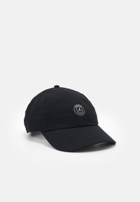 Black baseball cap made of cotton, featuring a round logo patch with "PARIS" text. Curved brim, adjustable strap at the back.