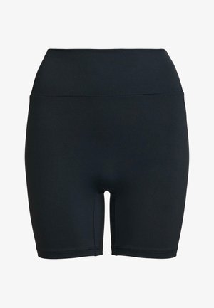 Shorts de vélo noirs taille haute en tissu extensible, avec une texture lisse et sans motifs visibles ni détails en métal.