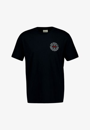 Fekete pamut póló, kerek nyakkivágással és rövid ujjakkal. A mellrészen egy kör alakú, fehér és piros szöveggel ellátott logó található.