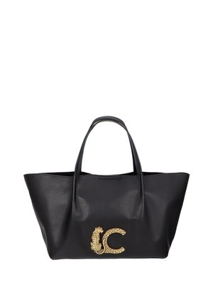 Bolso tote de cuero negro con dos asas y un adorno dorado de leopardo y la letra C en el centro del frente.