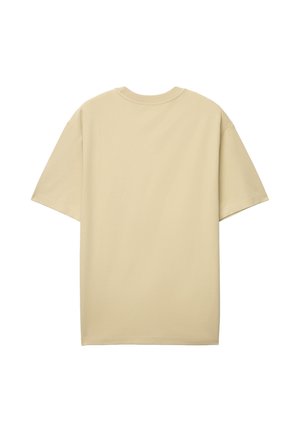 T-shirt à manches courtes couleur beige avec un col rond. Tissu en coton lisse, coupe décontractée, design uni. Aucun motif ou accent visible.