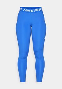 Niebieskie elastyczne legginsy z wysokim stanem z napisem "NIKE PRO" w białym kolorze, o gładkiej fakturze, pełnej długości, z małym logo Nike na nodze.