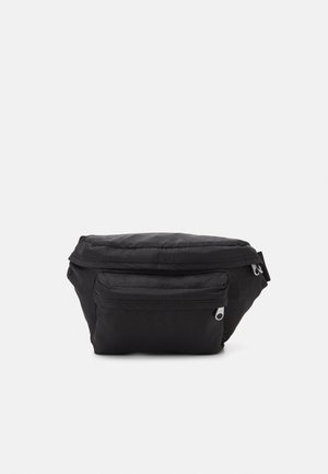 Sort pouch taske med en lynlåset hovedrum, en frontlomme og et blødt, tekstureret nylonstof. Kompakt og funktionelt design.