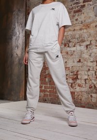 New Balance Pantalones deportivos - mottled light grey